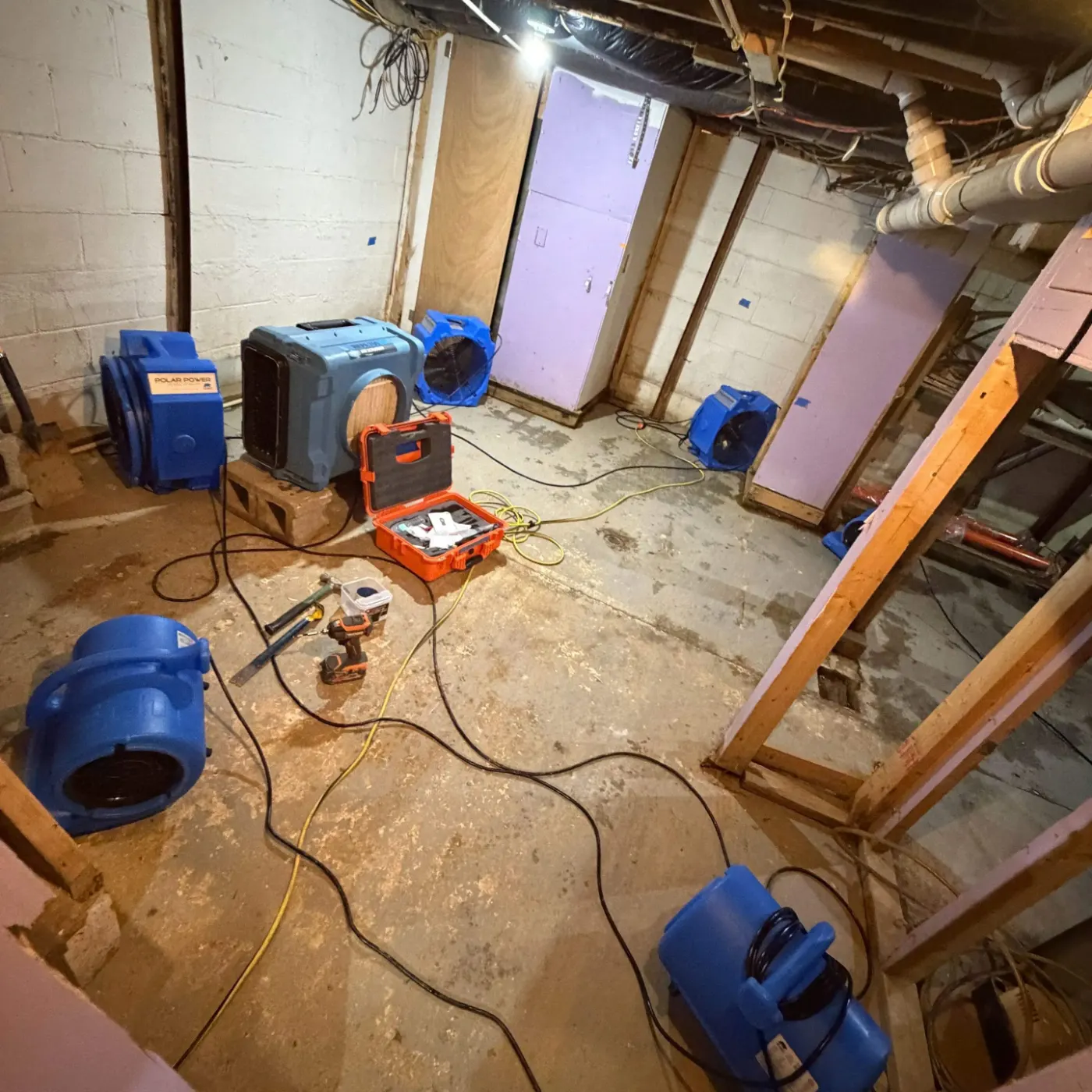 Sump pump backup water removal in Rocky Ripple residential basement